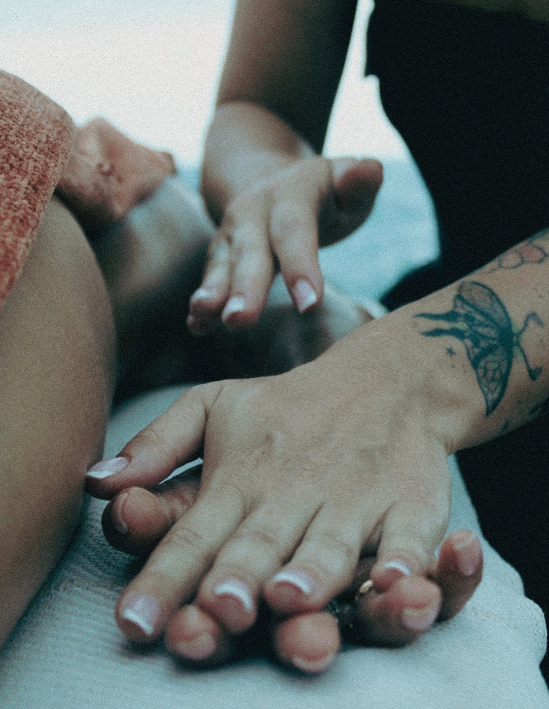 Close-up of Jules's hands during a treatment